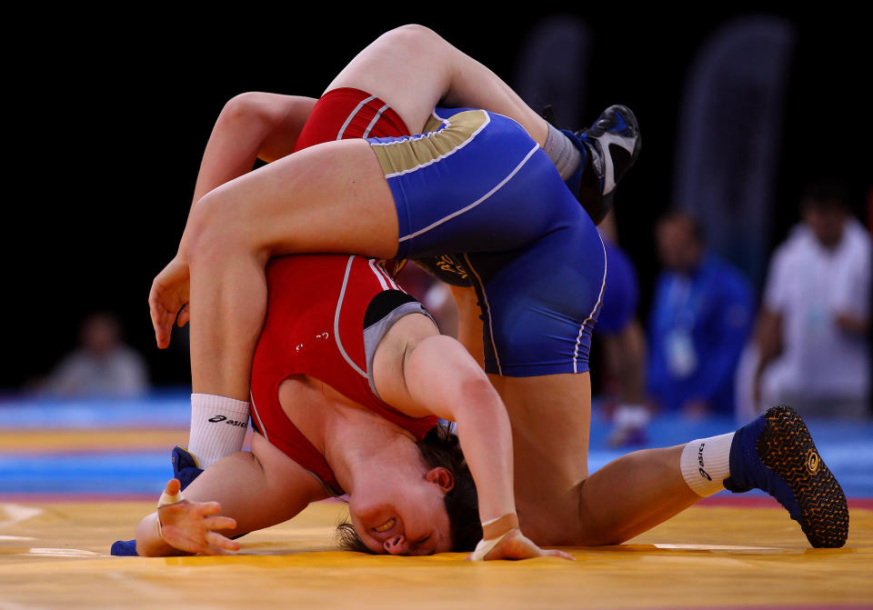 Chloe Spiteri of Great Britain is held by Ekaterine Bukina of Russia in the Women's Freestyle 72kg bout during the Wrestling LOCOG Test Event for London 2012 at ExCel on December 11, 2011 in London, England. (Warren Little/Getty Images)