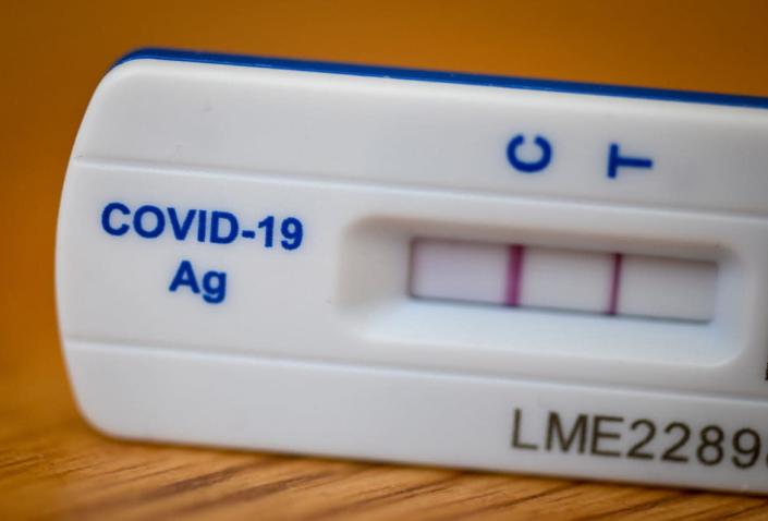 <div class="inline-image__caption"><p>A positive test is seen after using COVID-19 rapid antigen test kit, showing infection with coronavirus, on October 10, 2022 in Weymouth, England. </p></div> <div class="inline-image__credit">Finnbarr Webster/Getty Images</div>