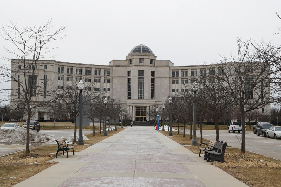 FILE - In this Friday, Jan. 17, 2020, file photo, The Michigan Supreme Court's Hall of Justice is seen in Lansing, Mich. SANTA FE, N.M. _ Court majorities are at stake beyond Washington, D.C., as voters chose justices for state supreme courts that have been thrust into politicized clashes over voter access and the emergency powers of governors fighting the coronavirus outbreak. Michigan Gov. Gretchen Whitmer, a Democrat, wants to flip control of the state’s Republican-majority high court. (AP Photo/Carlos Osorio, File)