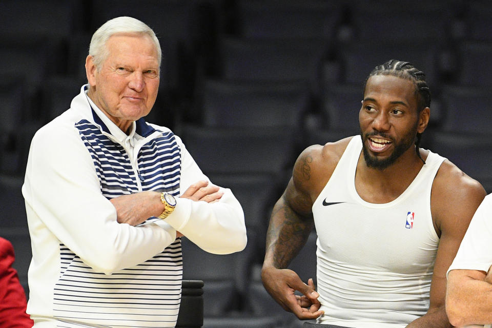 LOS ANGELES, CA - OCTOBER 13: Los Angeles Clippers executive board member Jerry West talks with Los Angeles Clippers Forward Kawhi Leonard (2) before a NBA preseason game between the Melbourne United and the Los Angeles Clippers on October 13, 2019 at STAPLES Center in Los Angeles, CA. (Photo by Brian Rothmuller/Icon Sportswire via Getty Images)