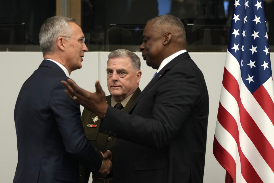 United States Secretary of Defense Lloyd Austin, right, greets NATO Secretary General Jens Stoltenberg, left, during a meeting of the Ukraine Defense Contact Group at NATO headquarters in Brussels, Thursday, June 15, 2023. NATO defense ministers are holding two days of meetings to discuss their support for Ukraine and ways to boost the defenses of eastern flank allies near Russia. A meeting of the Ukraine Contact Group is being held to drum up more military aid for the war-torn country. (AP Photo/Virginia Mayo)