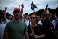 Self-proclaimed White Nationalists and members of the "Alt-Right" respond to counter-demonstrators during what they described as a "Freedom of Speech" rally at the Lincoln Memorial in Washington, U.S. June 25, 2017. REUTERS/James Lawler Duggan TEMPLATE OUT