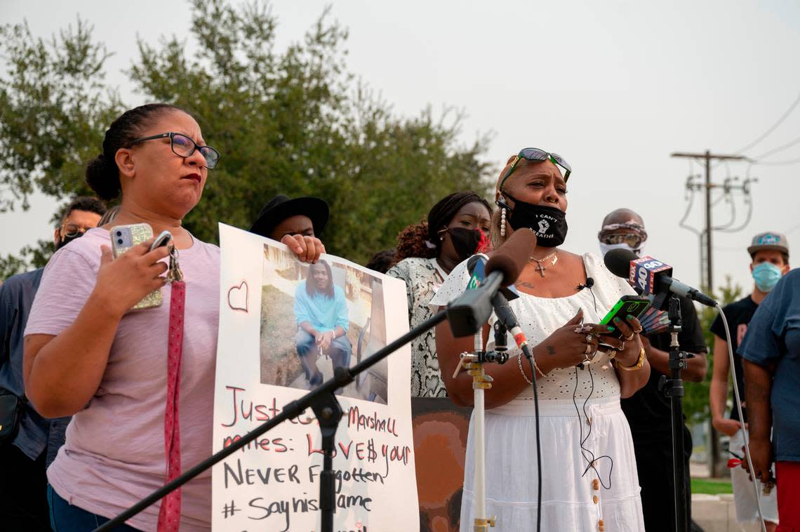 Latanya Andrews, right, whose son Marshall Miles died in custody at the Sacramento Main Jail in November 2018, speaks at a Black Lives Matter Sacramento press conference in 2020 with four other families of Black men and women killed by law enforcement in the Sacramento region. “My son deserved to have a chance for his life to be saved,” she said. “Police are supposed to protect and serve.” BLM leader Tanya Faison, left, holds a picture of Miles.