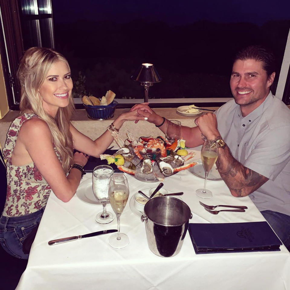 <p>The cute couple held hands as they enjoyed seafood and wine on a date night in August 2021. </p>