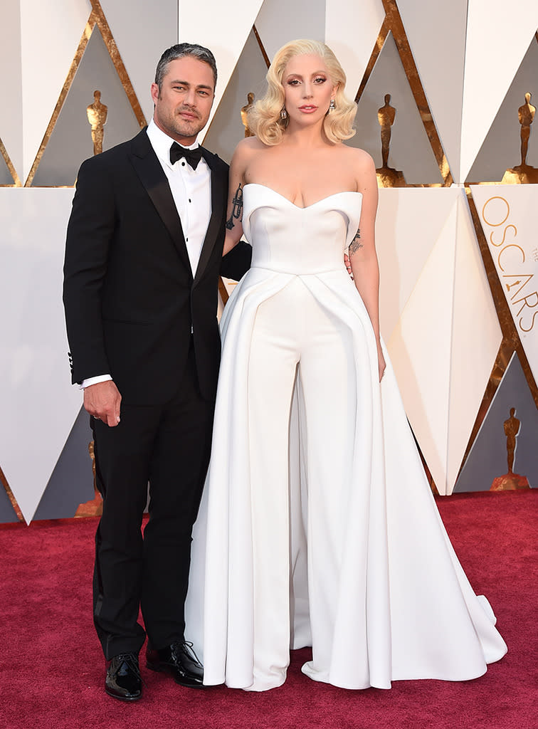 Taylor Kinney and Lady Gaga attend the 88th Annual Academy Awards at the Dolby Theatre on February 28, 2016, in Hollywood, California.