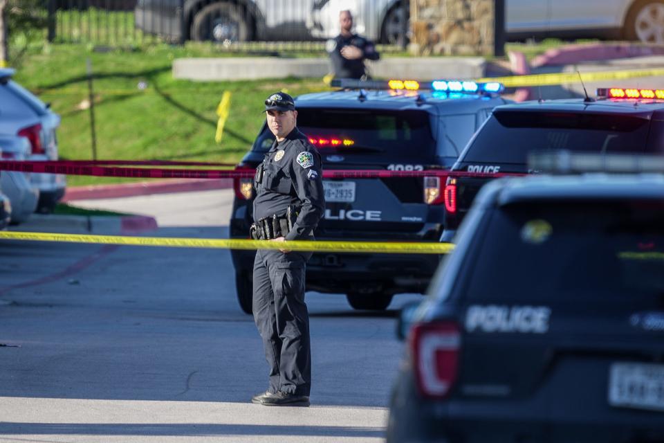 Austin police are seen near an apartment complex in Northeast Austin where an officer fatally shot a man who had pointed a gun at police, according to the Austin Police Department. Officials said it turned out to be a BB gun.