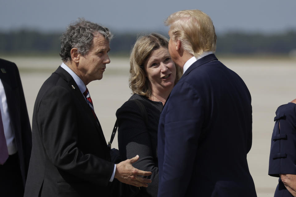 From left, Sherrod Brown, Nan Whaley, and Donald Trump