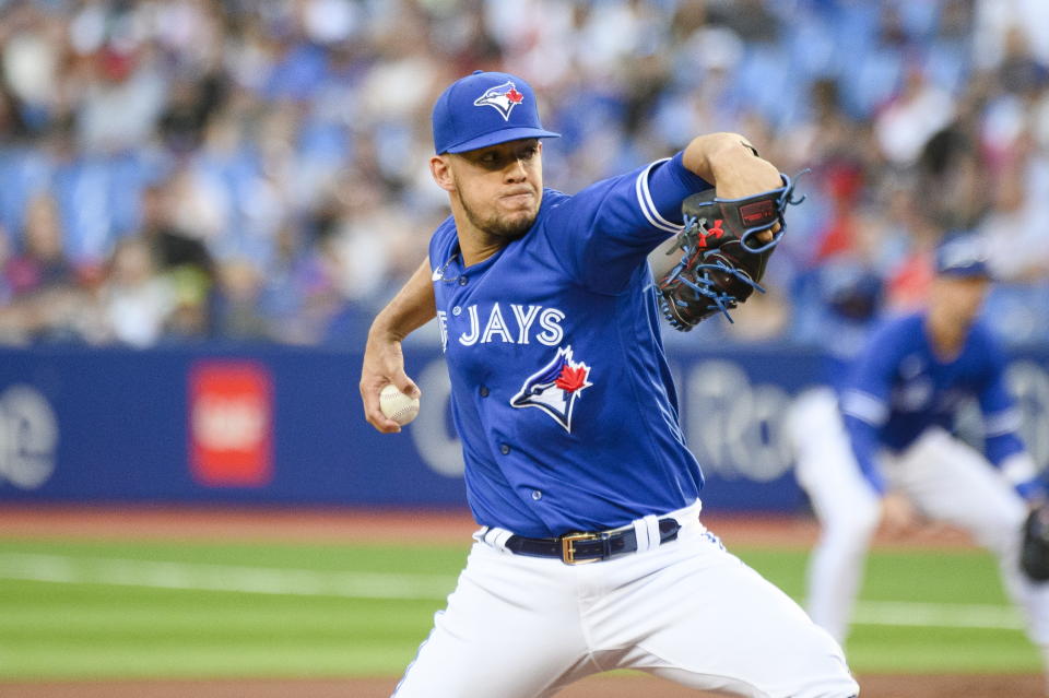 Toronto Blue Jays starting pitcher Jose Berrios (17) throws the ball during the first inning of a baseball game against the St. Louis Cardinals, Tuesday, July 26, 2022 in Toronto. (Christopher Katsarov/The Canadian Press via AP)