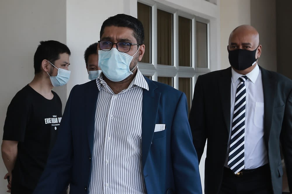 Former psychiatrist Dr Gurdeep Singh (left) is seen at the Magistrate’s Court in Petaling Jaya August 14, 2020. ― Picture by Ahmad Zamzahuri