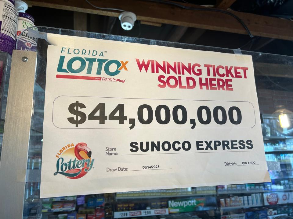 A photo of a sign hanging inside a Sunoco Express gas station in Kissimmee, Fla., where a lottery ticket worth $44 million was sold.