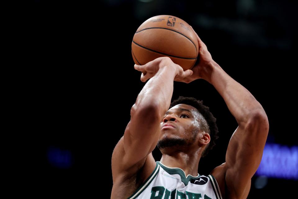 Giannis Antetokounmpo takes a free throw against the Brooklyn Nets on March 31, a game in which he became the franchise's all-time scoring leader.