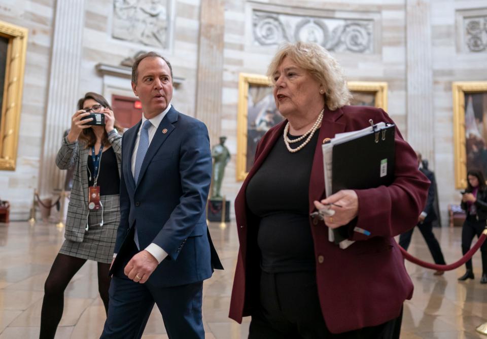 House Intelligence Committee Chairman Adam Schiff, D-Calif., and Rep. Zoe Lofgren, D-Calif., right, walk through the Capitol Rotunda during the impeachment trial of President Donald Trump on Friday.