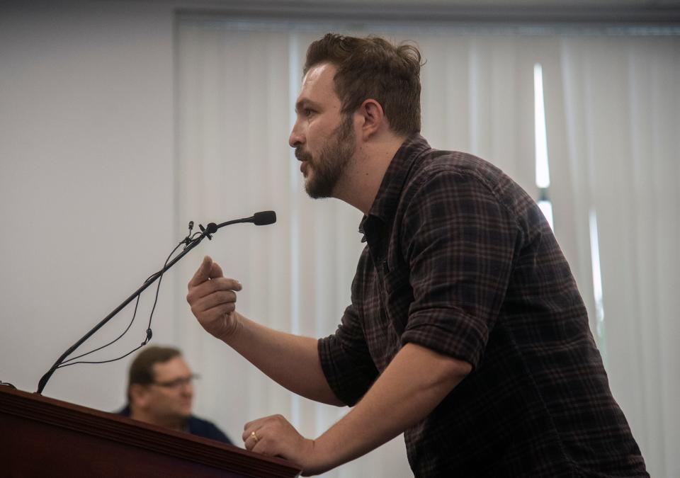 Gustavo Gonzalez speaks during public comment at a town hall meeting about the critical grand jury report at the SUSD headquarters in downtown Stockton. 