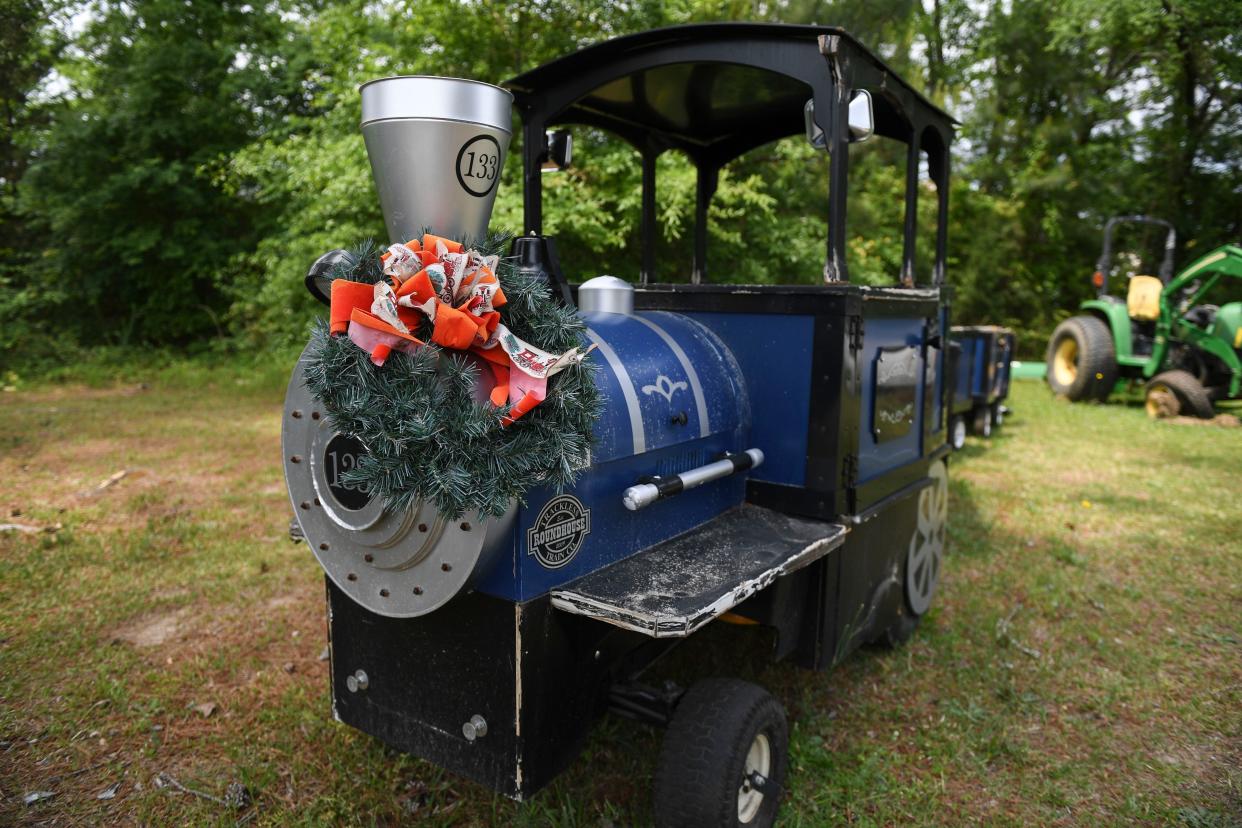 A miniature train sits in a lot behind the Columbia County Fleet Services building on Friday, May 3, 2024. These vehicles and more will be auctioned off by the county on May 18th.