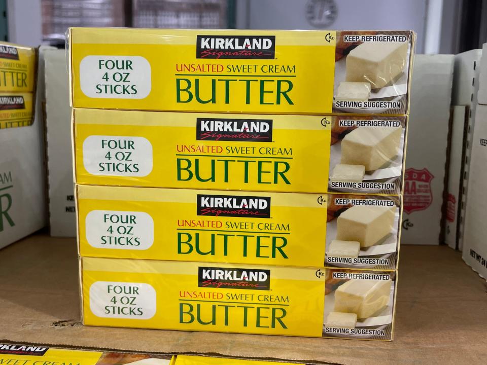 Yellow stack of unsalted butter on shelf at Costco