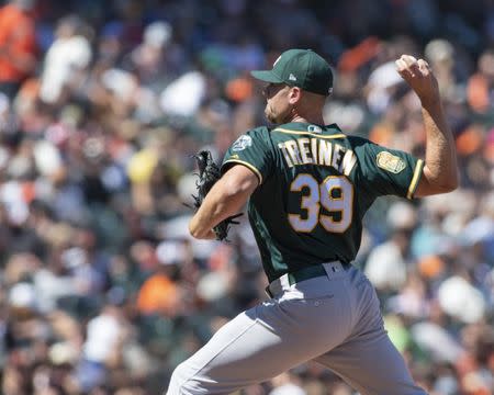 Jul 15, 2018; San Francisco, CA, USA; Oakland Athletics relief pitcher Blake Treinen (39) deliver a pitch during the ninth inning against the San Francisco Giants at AT&T Park. Mandatory Credit: Neville E. Guard-USA TODAY Sports