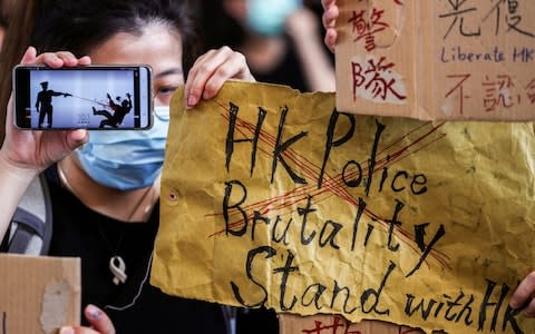 Protesters have rallied to support the teenager who was shot  - Credit: Athit Perawongmetha/AFP