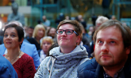 SPD supporters react after first exit polls of the Saarland state elections at the Social Democratic Party (SPD) headquarters in Berlin, Germany, March 26, 2017. REUTERS/Hannibal Hanschke