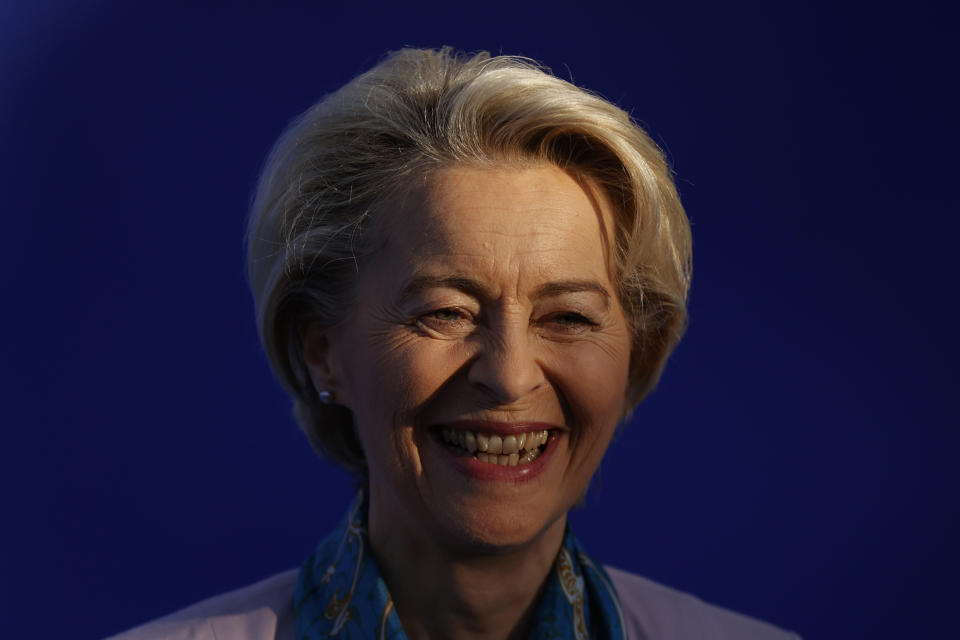 European Commission President Ursula von der Leyen smiles on arrival for the 2nd day of the Europe Summit in Granada, Spain, Friday, Oct. 6, 2023. European Union leaders have pledged Ukrainian President Volodymyr Zelenskyy their unwavering support. On Friday, they will face one of their worst political headaches on a key commitment. How and when to welcome debt-laden and war-battered Ukraine into the bloc. (AP Photo/Fermin Rodriguez)