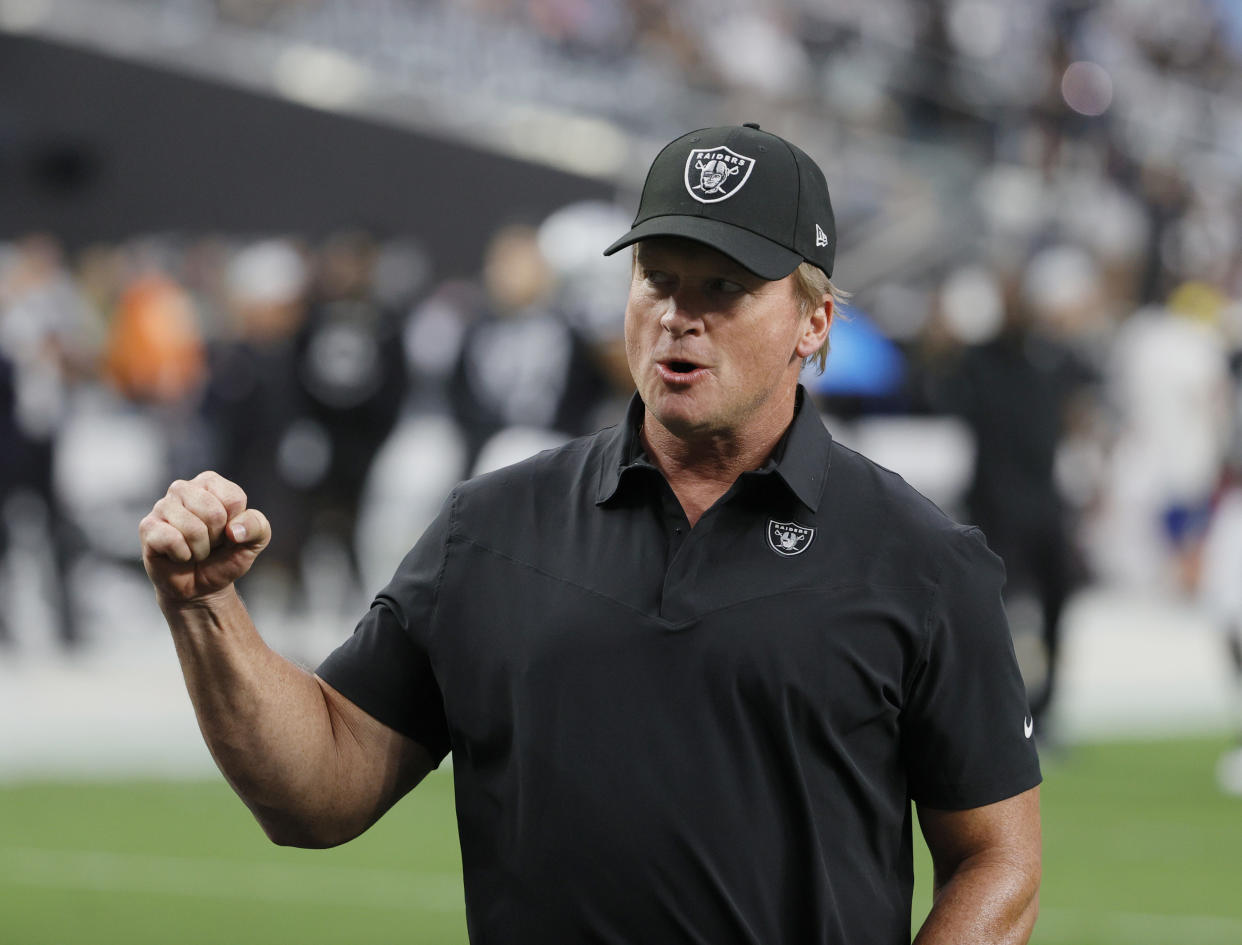 LAS VEGAS, NEVADA - AUGUST 14:  Head coach Jon Gruden of the Las Vegas Raiders reacts to the crowd during warmups before a preseason game against the Seattle Seahawks at Allegiant Stadium on August 14, 2021 in Las Vegas, Nevada.  (Photo by Ethan Miller/Getty Images)