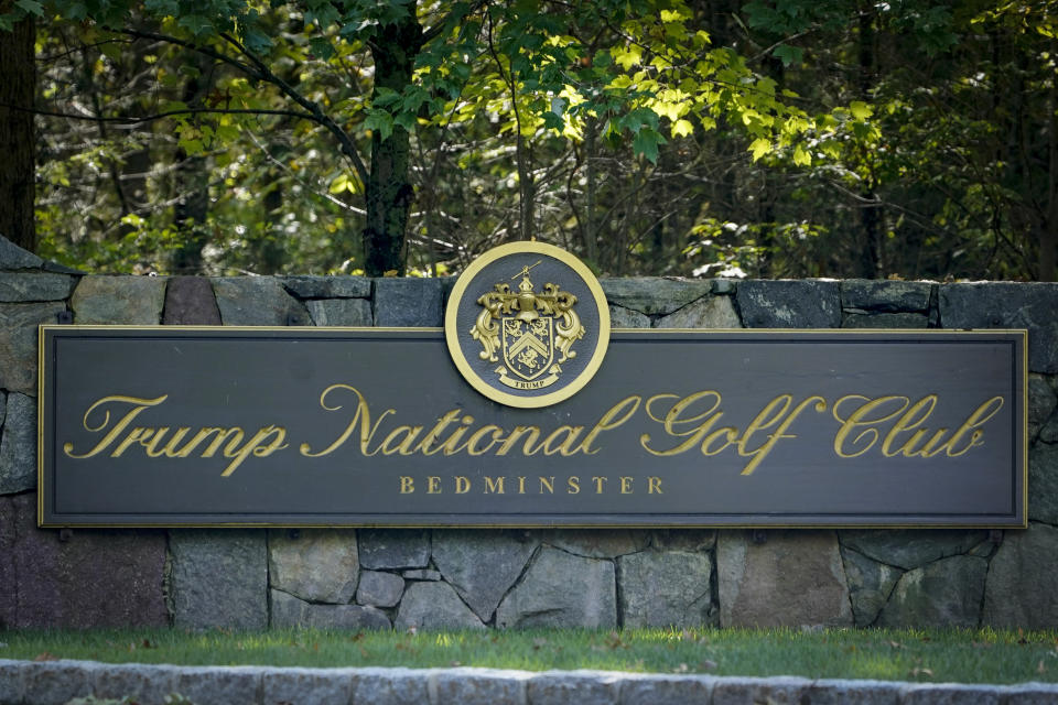FILE - This photo from Friday Oct. 2, 2020, shows a sign at the entrance to Trump National Golf Club in Bedminster, N.J. The PGA canceled its tournament at President Donald Trump's golf course since the deadly riots at the U.S. Capitol. (AP Photo/Seth Wenig, File)
