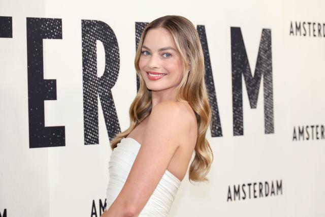 Margot Robbie makes a fashion fail wearing white bra under sheer