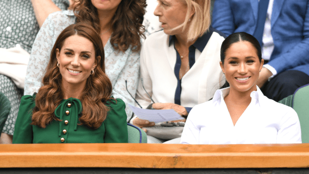 <em>Meghan Markle, Duchess of Sussex, in a Hugo Boss skirt and Kate Middleton, Duchess of Cambridge, in a Dolce & Gabbana Dress at </em>the Wimbledon women's singles final in London, England. Photo: Karwai Tang/Getty Images
