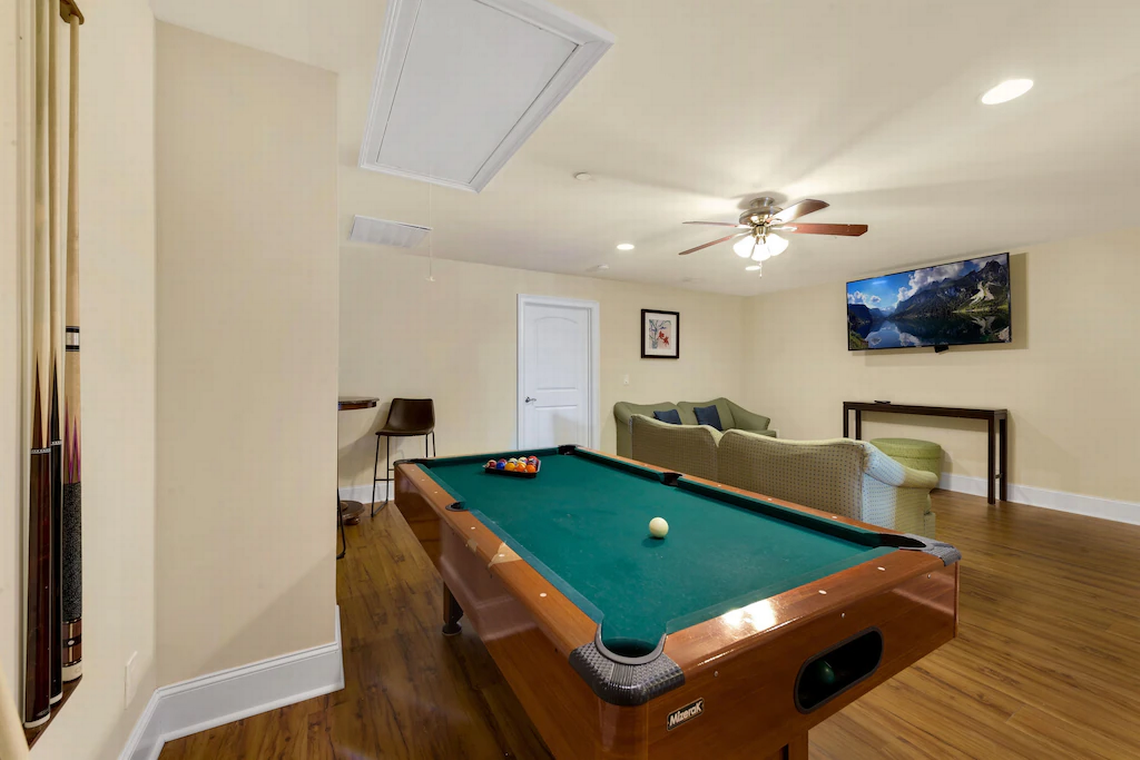Game room at Motley Crew townhome in Central Myrtle Beach. Screenshot of listing. January 5, 2022.