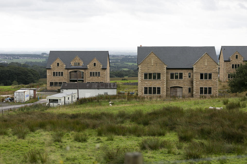 The Five luxury mansions, Bolton, Lancs, which face demolition. See SWNS story SWLEhouses; The owners of five luxury mansions which were built too big and in the wrong place face the threat of having their million-pound homes demolished. Residents wanted to broker a deal with a local council after it was found the properties were not built in accordance with planning permission. It had been hoped council chiefs would wave through the latest application after it was recommended for approval by town planners. But the revised plans, which involved knocking down and rebuilding two properties and reducing the size of another at a cost of more than Â£1m, was last week thrown out by councillors.

