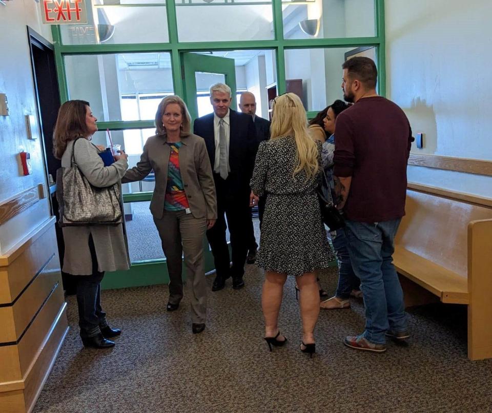 Special Prosecutor Lisa Tanner, second from left, and Wichita County District Attorney John Gillespie, third from left, are shown Thursday, March 2, 2023, after a day in a Fort Worth courtroom in the James Irven Staley III murder trial in connection with the death of 2-year-old Jason Wilder McDaniel.