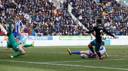 Soccer Football - FA Cup Quarter Final - Wigan Athletic vs Southampton - DW Stadium, Wigan, Britain - March 18, 2018 Southampton's Cedric Soares scores their second goal REUTERS/Phil Noble