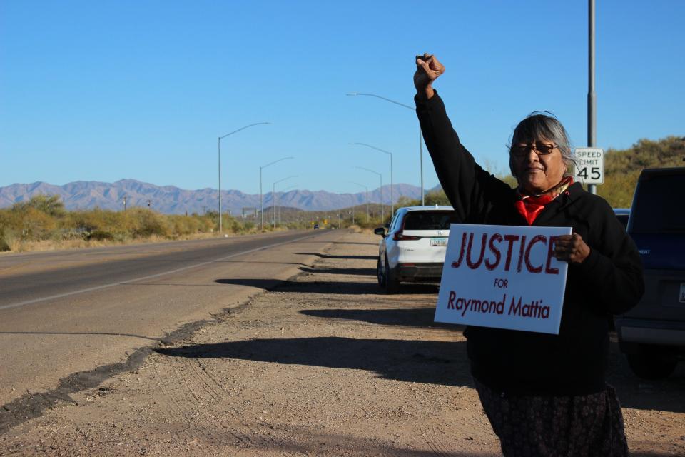 The family of Raymond Mattia and attendees gather outside of the Tohono O'odham Nation Police Department in Sells, Arizona, for a peaceful protest calling for more accountability from the department on Friday, December 15, 2023.