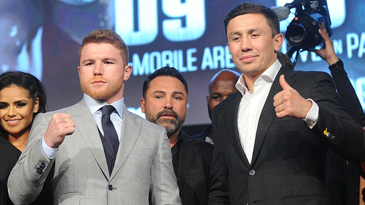 Canelo Alvarez (L) poses with Gennady Golovkin (R) to promote their Sept. 16 middleweight title bout in Las Vegas.