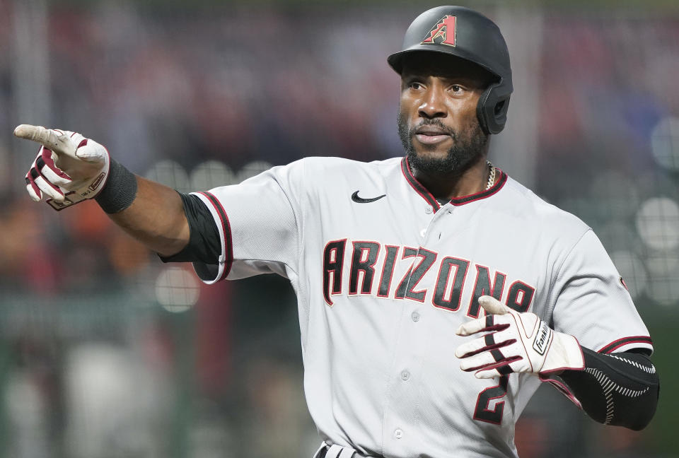 SAN FRANCISCO, CALIFORNIA - AUGUST 22: Starling Marte #2 of the Arizona Diamondbacks reacts towards a teammate after he scored against the San Francisco Giants in the top of the seventh inning at Oracle Park on August 22, 2020 in San Francisco, California. (Photo by Thearon W. Henderson/Getty Images)