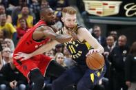 Jan 23, 2019; Indianapolis, IN, USA; Indiana Pacers forward Domantas Sabonis (11) is guarded by Toronto Raptors center Serge Ibaka (9) during the fourth quarter at Bankers Life Fieldhouse. Mandatory Credit: Brian Spurlock-USA TODAY Sports