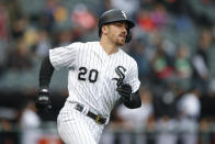 Chicago White Sox's Danny Mendick rounds the bases after hitting a two-run home run off of Detroit Tigers' Edwin Jackson during the sixth inning of game one of a baseball doubleheader, Saturday, Sept. 28, 2019, in Chicago. Ryan Cordell scored on a play. (AP Photo/Kamil Krzaczynski)