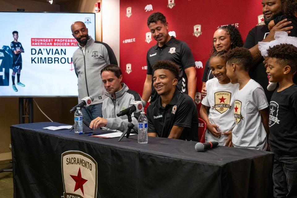 13-year old soccer phenom Da’vian Kimbrough is surrounded by his family and Sacramento Republic FC management after signing a contract Aug. 8 making him the youngest professional athlete in American sports history.