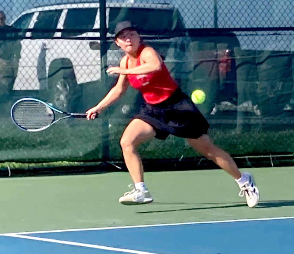 Fairview's Vivian Liu tracks down a baseline shot hit by Cathedral Prep opponent Anna Poranski in their No. 1 singles match during Wednesday's Region 2 girls tennis dual at the Chris Batchelor Memorial Courts. Although Liu beat Poranski 6-2, 6-0, the Ramblers still defeated the Tigers 3-2.