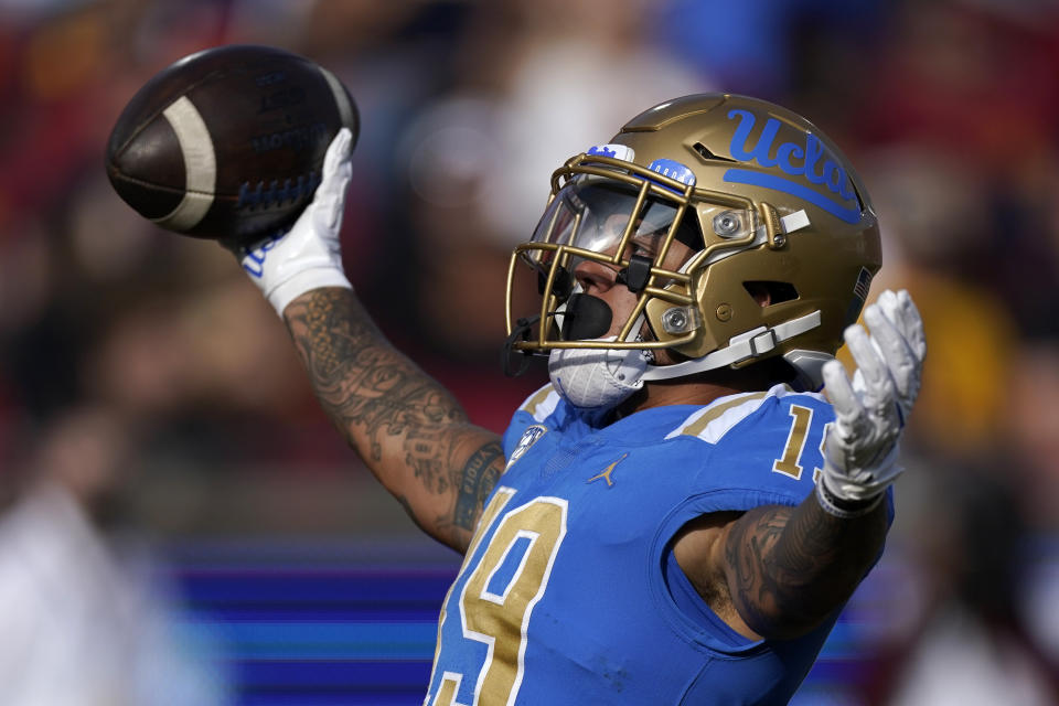 UCLA running back Kazmeir Allen celebrates after scoring a touchdown during the first half of an NCAA college football game against Southern California Saturday, Nov. 20, 2021, in Los Angeles. (AP Photo/Mark J. Terrill)