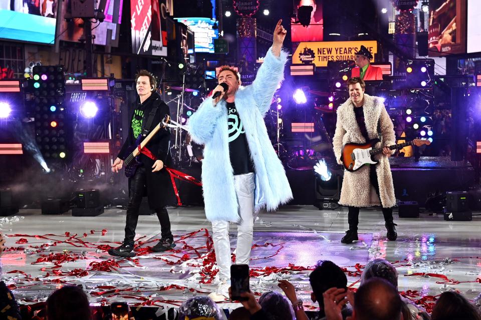 Duran Duran performs on stage during the Times Square New Year's Eve 2023 Celebration on December 31, 2022 in New York City.