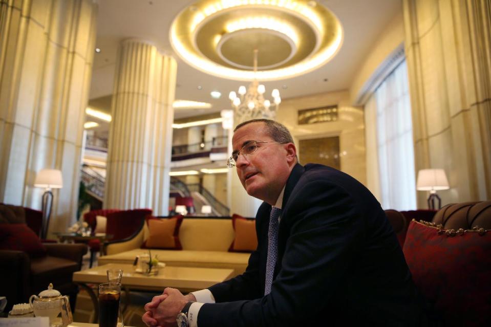 David C. Chavern, executive vice president and chief operating officer at the U.S. Chamber of Commerce speak during an interview with The Associated Press after a business conference in Abu Dhabi, United Arab Emirates, Sunday, March 9, 2014. The U.S. Secretary of Commerce is in the Gulf meeting with officials in the United Arab Emirates, Saudi Arabia and Qatar with a message that closer economic cooperation with Washington can be a bridge for security.(AP Photo/Kamran Jebreili)