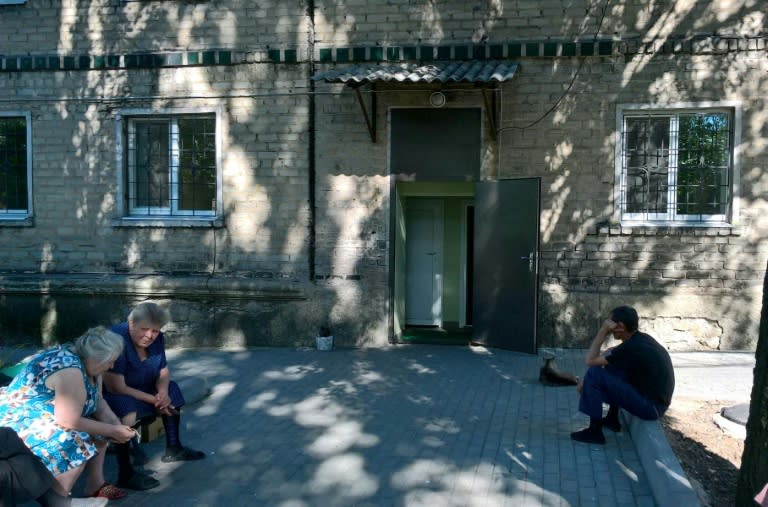 At a tuberculosis clinic, just 10 kms from the front line, about 10 patients are stuck, usually due to expired ID documents needed to cross the conflict zone