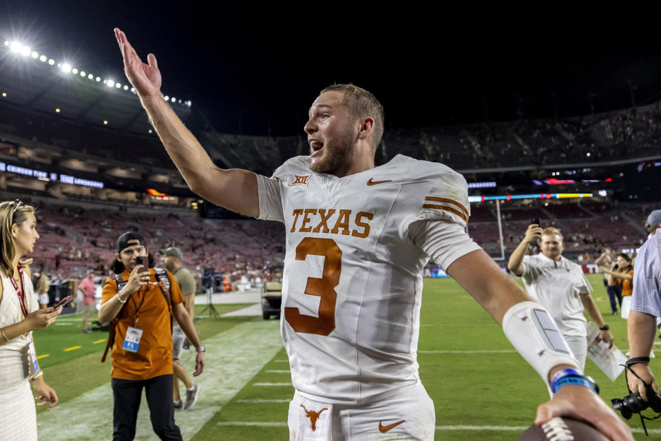 Texas quarterback Quinn Ewers (3) celebrates the team's win over Alabama in an NCAA college football game Saturday, Sept. 9, 2023, in Tuscaloosa, Ala. (AP Photo/Vasha Hunt)