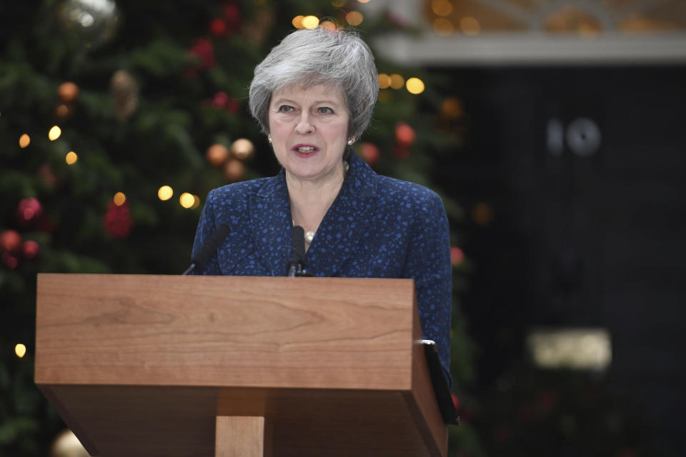 Britain's Prime Minister Theresa May makes a media statement in Downing Street, London, confirming there will be a vote of confidence in her leadership of the Conservative Party, Wednesday Dec. 12, 2018. The vote of confidence will be held in Parliament Wednesday evening, with the result expected to be announced soon after. (Stefan Rousseau/PA via AP)