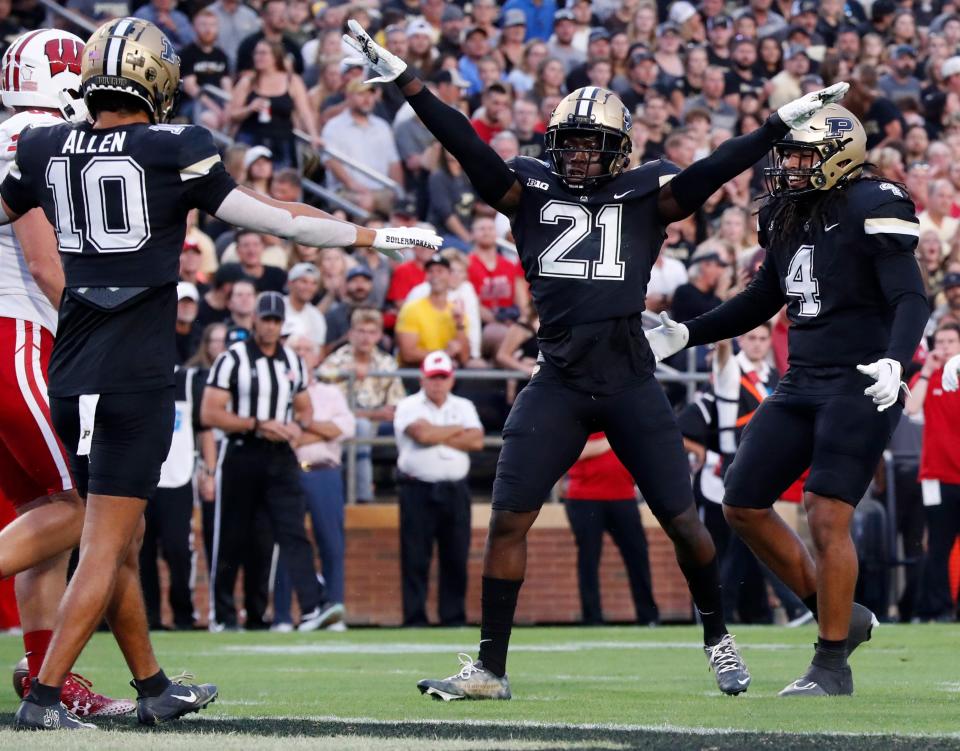 Purdue Boilermakers defensive back Sanoussi Kane (21) celebrates with teammates after getting a defensive stop during the NCAA football game against the Wisconsin Badgers, Friday, Sept. 22, 2023, at Ross-Ade Stadium in West Lafayette, Ind. Wisconsin Badgers won 38-17.