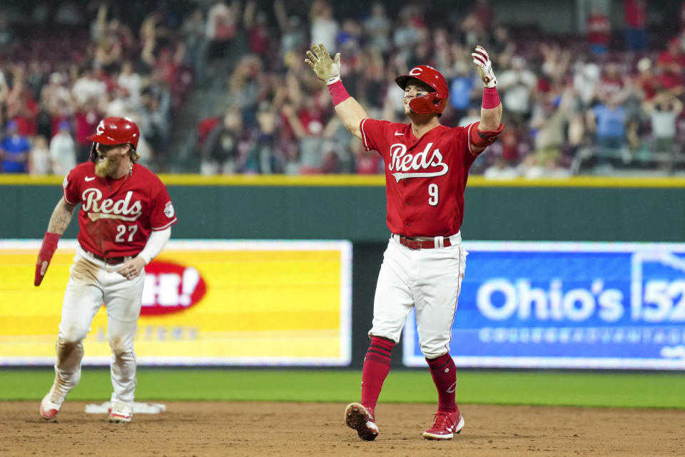 Cincinnati Reds' Matt McLain celebrates after driving in the winning run with a single against the Los Angeles Dodgers during the ninth inning of a baseball game in Cincinnati, Tuesday, June 6, 2023. (AP Photo/Aaron Doster)