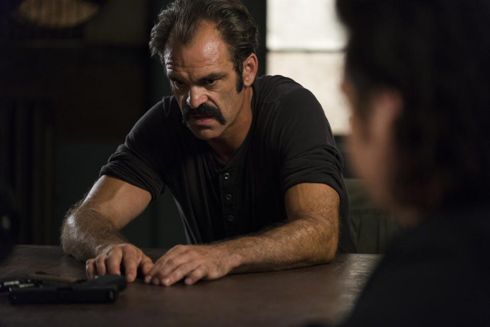 <p>Steven Ogg as Simon and Josh McDermitt as Dr. Eugene Porter in AMC’s <i>The Walking Dead.><br> (Photo: Gene Page/AMC)</i> </p>