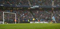 Manchester City's Yaya Toure scores his second goal during the Barclays Premier League match at the Etihad Stadium, Manchester.