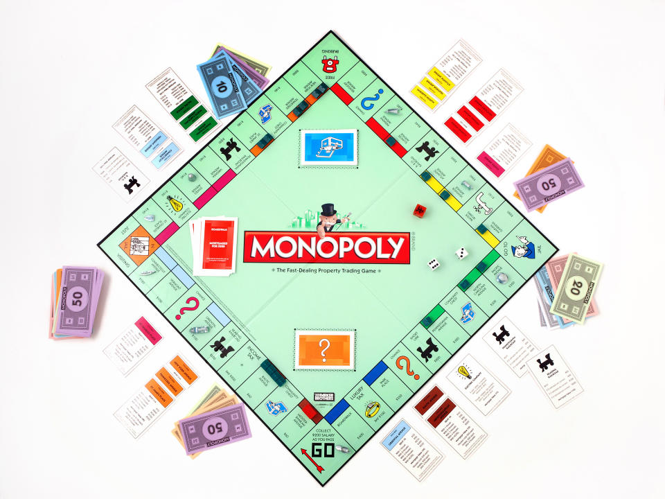 This product image provided by Hasbro, shows the board game Monopoly. The end is near for the shoe, wheelbarrow or iron in the classic Monopoly game as fans vote Tuesday, Feb. 5, 2013 in the final hours of a contest to determine which token to eliminate and which piece to replace it with. (AP Photo/Hasbro, File)