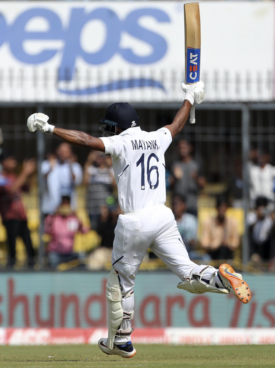 India's Mayank Agarwal runs to celebrate scoring a century during the second day of first cricket test match between India and Bangladesh in Indore, India, Friday, Nov. 15, 2019. (AP Photo/Aijaz Rahi)